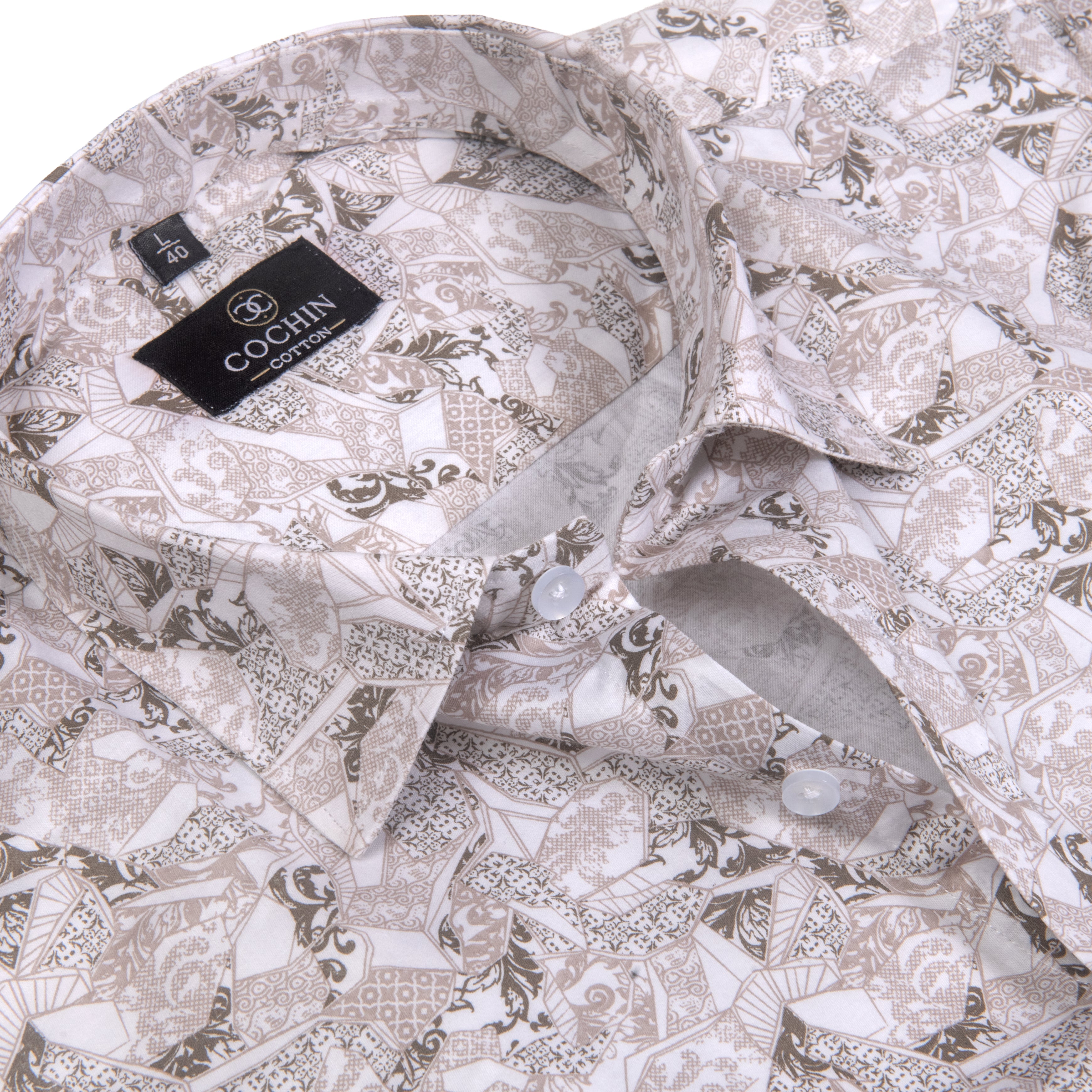 A close-up of a patterned button-up shirt by COOFIN, featuring a beige, white, and brown geometric and floral print. The brand label 'COOFIN' is visible on the collar.