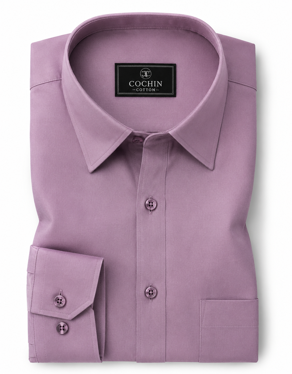 Folded purple shirt with 'Cochin Cotton' label on a white background