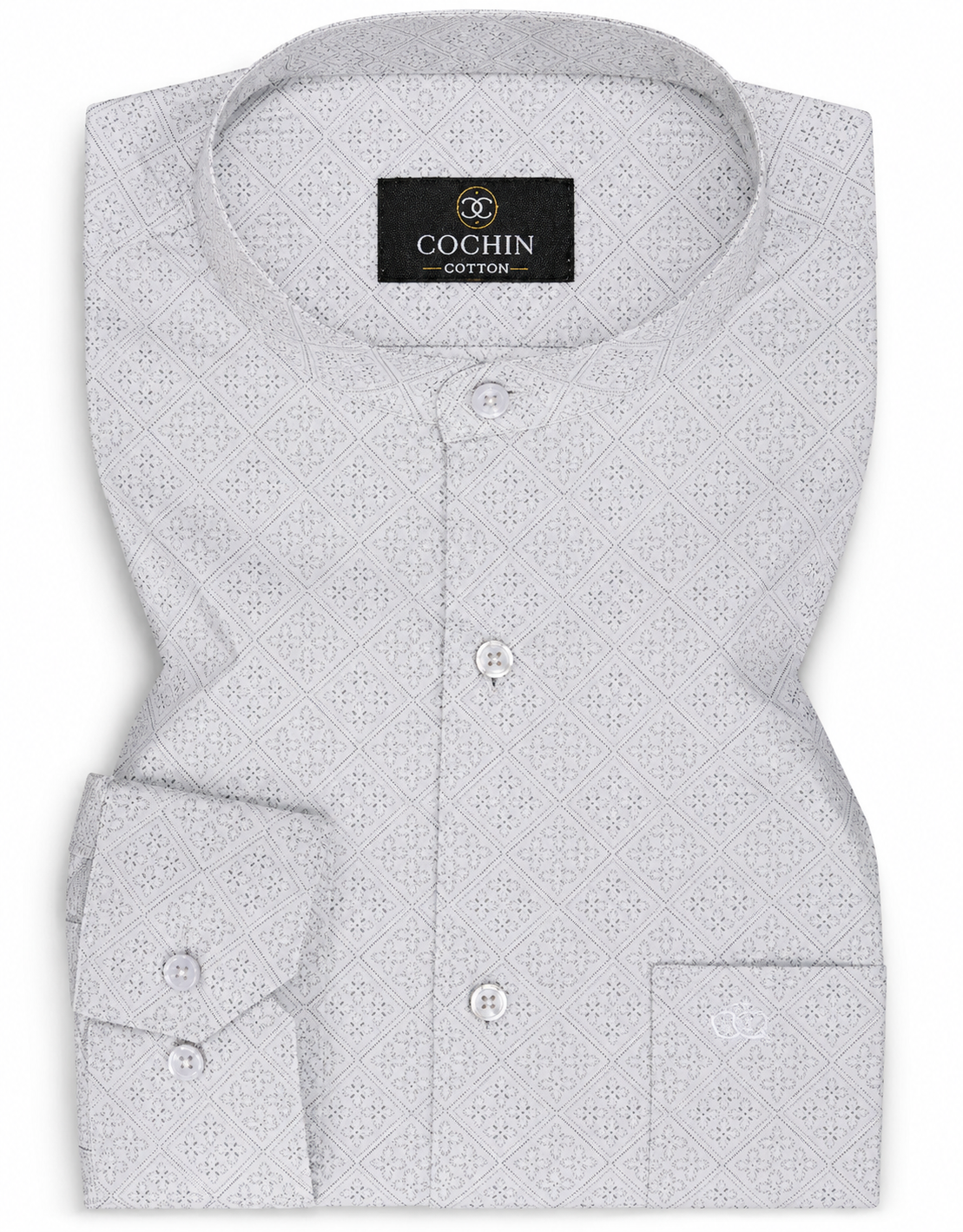 Folded light gray shirt with subtle pattern on a white background, branded 'Cochin'.