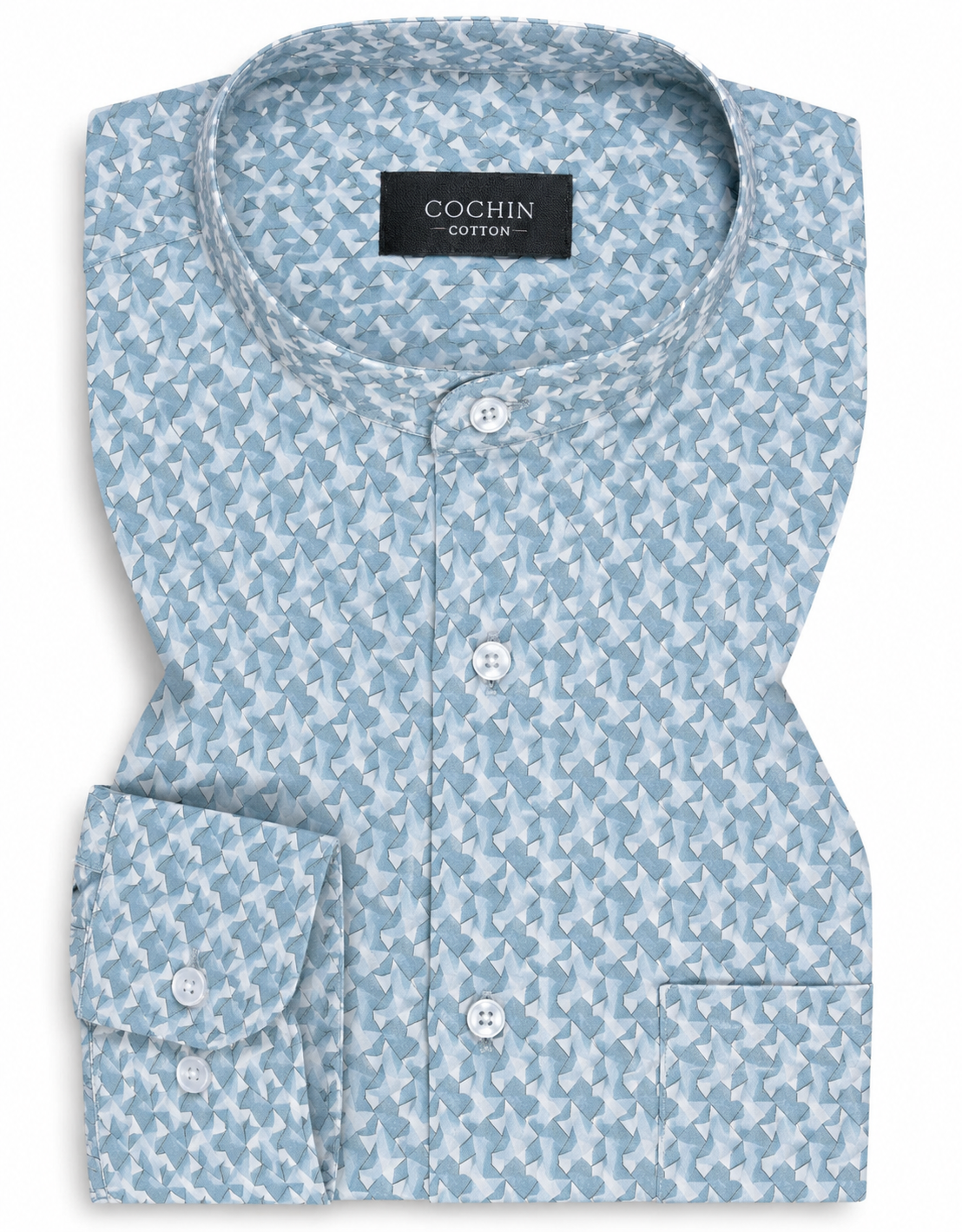 Folded light blue patterned shirt with 'Cochin Cotton' label on a white background
