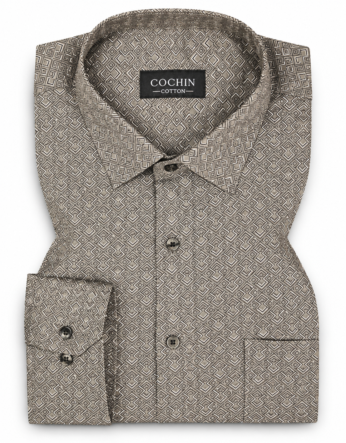 Folded brown patterned shirt with 'Cochin Cotton' label on a white background