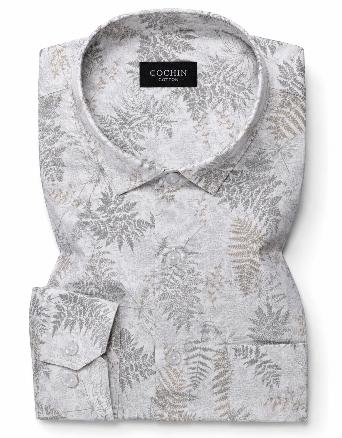 Floral patterned shirt with 'Cochin Cotton' label on a white background