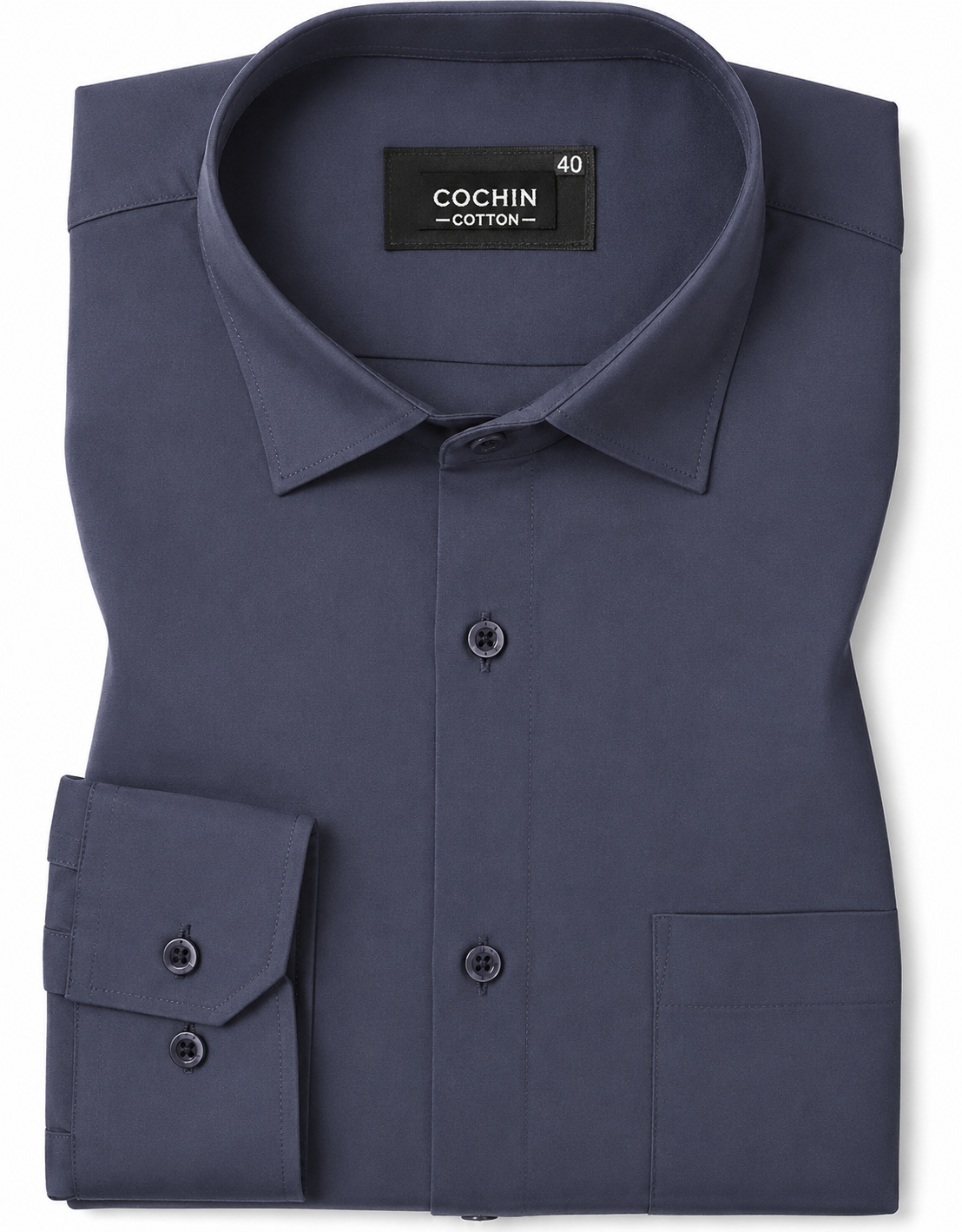 Folded navy blue shirt with 'Cochin Cotton' label on a white background